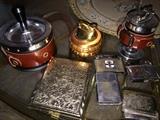 Military and Mid Century cigarette lighters.