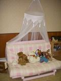 Cute child's futon with 'mosquito netting' decorative accent