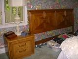 Night stand, headboard & frame to king bedroom suite.  Vintage table lamp complete with prisms