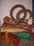 Heavy maple table, decorative items, and gas cans
