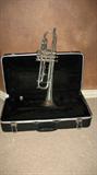 This is a Getzen capri silver trumplet w/ bach 7C MPC. It does come with a mouth piece and case. It does need a good cleaning and pinky support.. cost for tune-up $110. This is a very good name brand and good quality trumplet. Price will reflect having to get a tune-up.