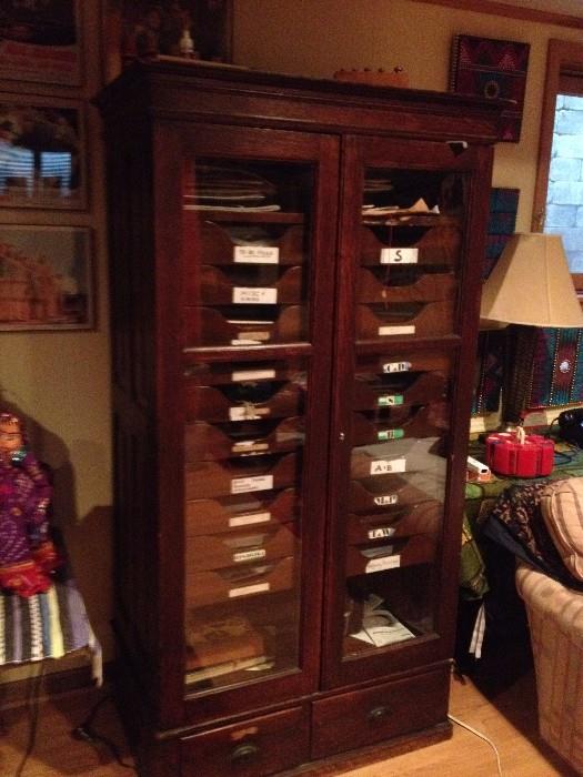 antique glass-front filing cabinet
