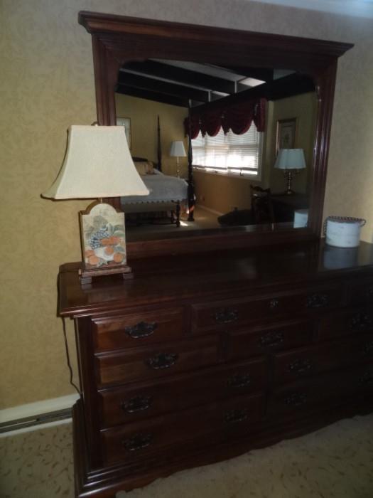 Sterling House Cherry Dresser with mirror. Measures 64"W X 34" H X 20" Deep, Mirror measures-39" Tall X 47" W