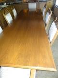 Huge Beautiful Dining Room Table measures 10' Long by 42" wide with 12 chairs & two extensions measuring 27" each 