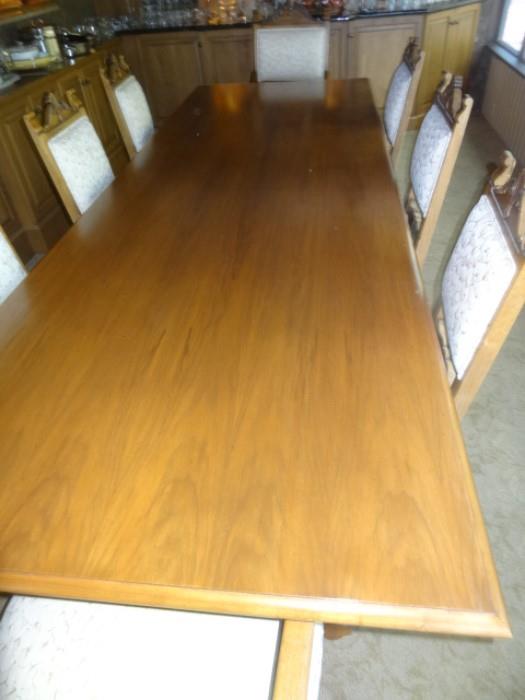 Huge Beautiful Dining Room Table measures 10' Long by 42" wide with 12 chairs & two extensions measuring 27" each