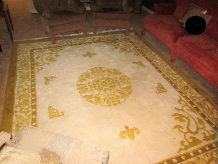 Hand-sculpted, wool area rug; Chinese motif with center medallion. Approximately 8' x 10'.