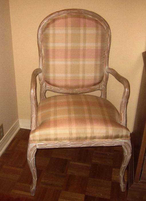 One of two country French open arm chairs; Whitewashed finish. Maker is unknown.