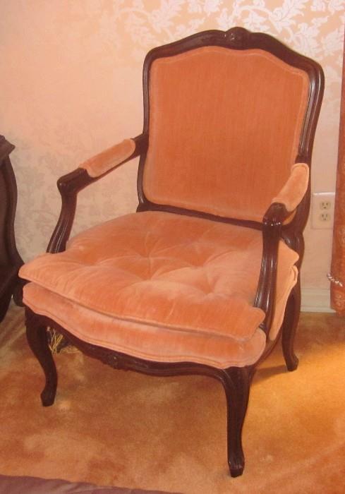 Upholstered, carved French open arm chair with upholstered arms, and tufted seat. Made by Hickory Furniture.