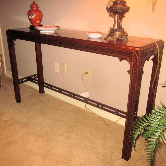 Chinese Chippendale console table. 51" l; 14" d; 29.5" h.