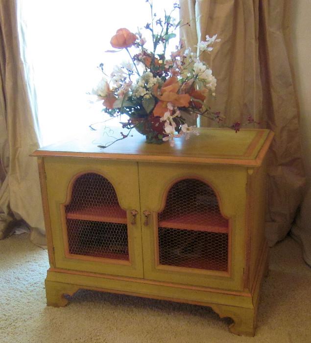 Chinese style cabinet with painted finish; Two mesh doors.