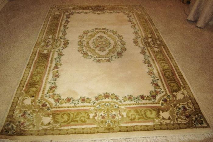 Hand-woven, hand-carved, wool rug; Chinese motif. Approximately 6' x 9'. 