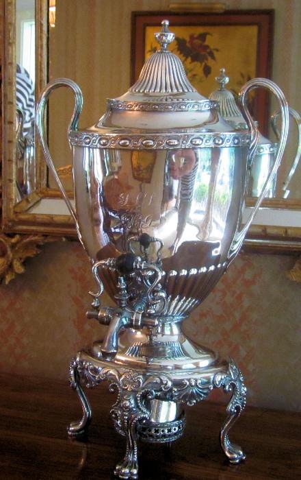 Magnificent old coffee urn with warmer. Ornate, silver plate urn is monogrammed and has some denting on back side. 18.5" tall.