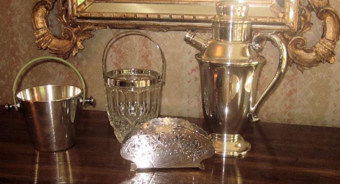 Very nice cocktail shaker and other silver plate pieces.