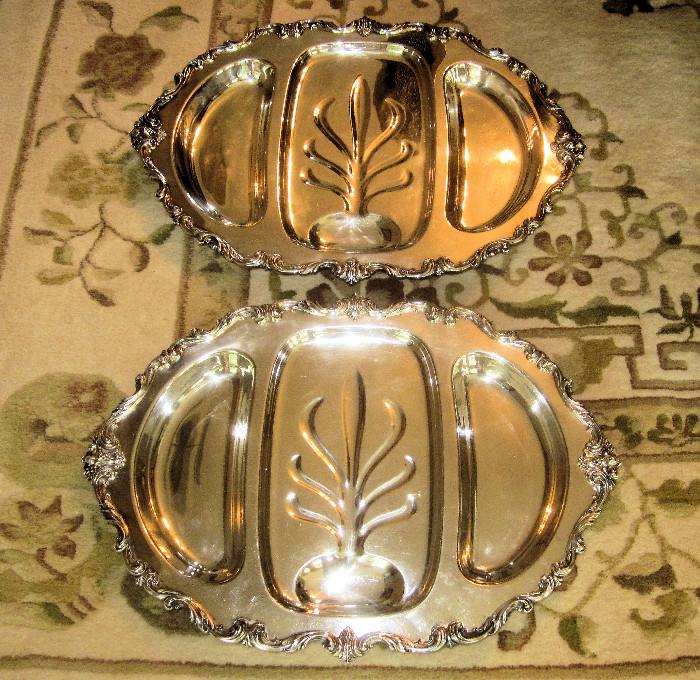 Large silver plate serving pieces.