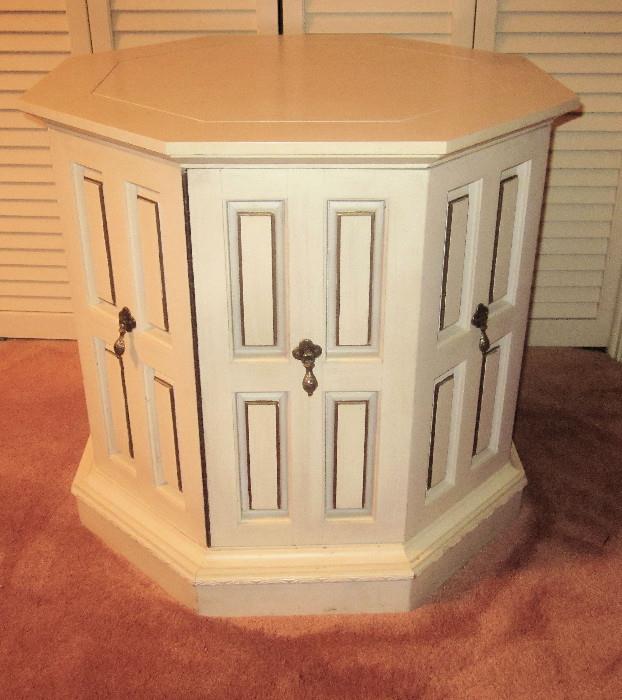 Octagonal, table with door; Coordinates with oriental-style bedroom furniture and was used as a night stand.