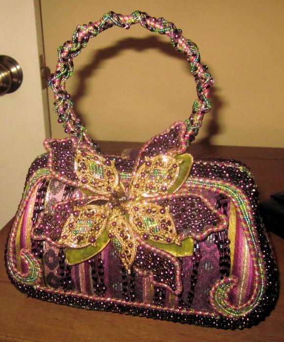 A beaded hand bag made by Mary Frances. Very nice condition.