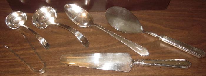 "William and Mary" sterling serving pieces by Lunt Silver. These accompany the sterling flatware in the previous photo.
