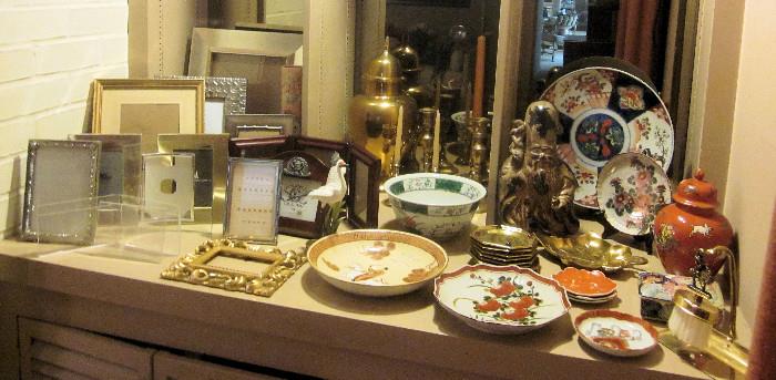 More decorative accessories, and assortment of picture frames.