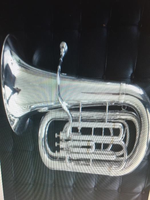 Besson 3valve BbB piston tuba BE787
 Made in London.  Silver