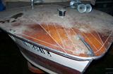 Carter Craft Seahawk boat--beautiful! The mahogany hull shines up nicely. Small (2") hole in outer hull.