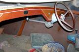 Inside Carter Craft Seahawk boat. Called an "overnighter" because a bed will fit inside and it has portholes. So romantic! Red and white seats in very good condition.