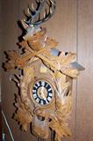 Vintage cuckoo clocks--this one Black Forest hunting theme--runs and "cuckoos".