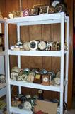 Shelves of clocks.
