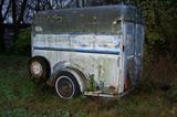 Box trailer. Good metal bones, needs new plywood body.