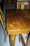 Another view of antique dining table.