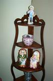 Vintage corner shelf and figurines.