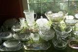 Tables full of glassware, china, figurines, kitchen ware--antique, vintage and contemporary.