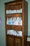 Dozens of Precious Moments figurines--many with boxes.
