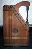 Vintage fretless zither, American Music Co., Kansas City, MO label.