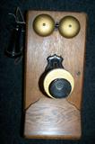 Nice and complete--antique oak wall telephone. Owner remembers it being used in home in 1950's.