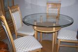 Contemporary round table and 3 chairs--light natural color, excellent upholstery.