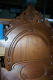 Stunning antique walnut Victorian bed--headboard, footboard with deeply carved acorn designs.