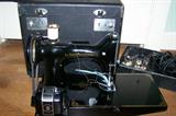 SOLD--Singer Featherweight sewing machine. Looks great!
