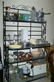 Baker's rack--large metal rack with glass shelves--filled with lots of good stuff--bar ware, aluminum ware, copper and more.