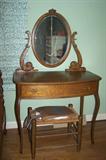 Antique dressing table with mirror, woven bench/footstool.