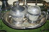 Antique silver plated and glass--covered sugar and open matching piece, trays, bowls.