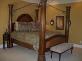 Fabulous kingsize bedroom group--massive poster bed, dresser with mirror, armoire--all matching. Finish off the room with complementary side tables, desk, framed prints, sconces, other small furniture and decorative pieces.