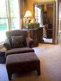 Beautiful furniture in every room--chairs, tables, lamps and decor. Shown here, leopard print chaise with ottoman, large framed mirror.