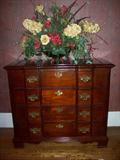Small block front chest in dining room. Note beautiful floral arrangement!