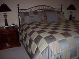 Another bedroom--kingsize bed, nightstands and more.