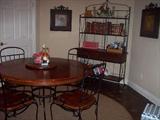 Casual dining table and chairs, baker's rack and more.
