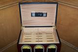 Diamond Crown humidor cabinet with lift-top and one drawer.