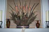 Many beautiful decorative floral and greenery arrangements.
