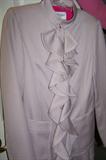 Yves Saint Laurent suit in pale lilac--another one in black.