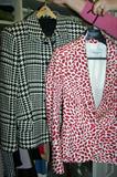 Versace jacket (black and white); Yves Saint Laurent jacket (red and white).