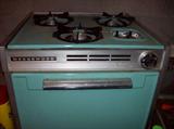 Vintage aqua stove top with oven for built-in.